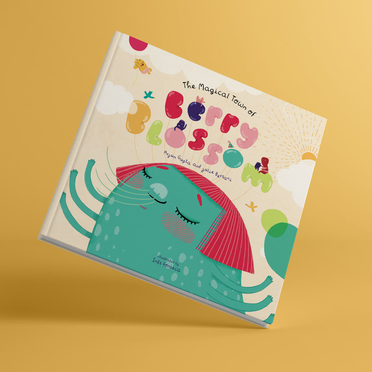 The Berry Blossom hardcover standing against a warm yellow studio background